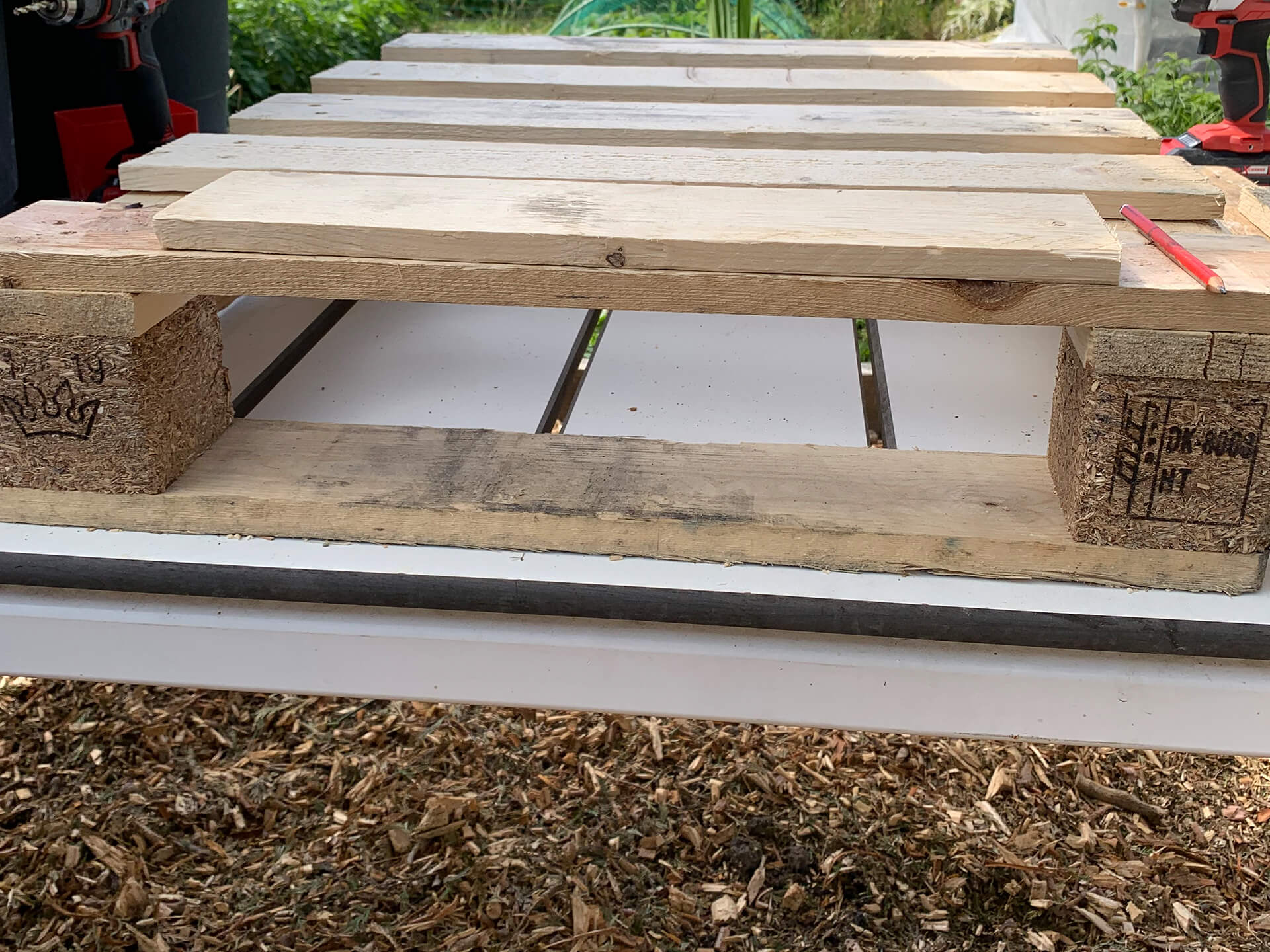 Side image of a wood piece for the trug on wheels. 
