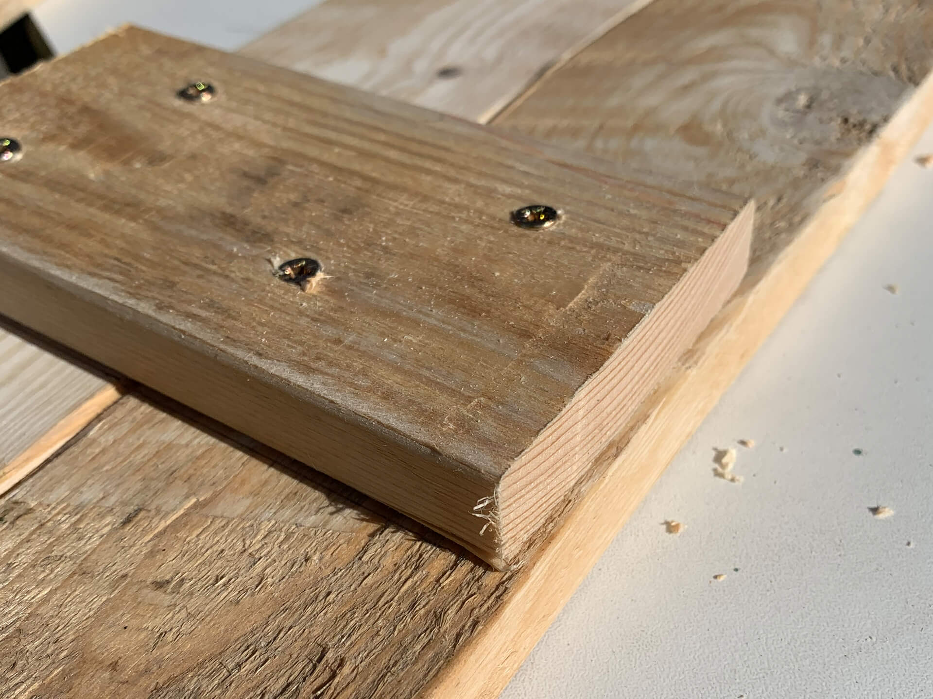 Wood piece attached onto another wood piece.