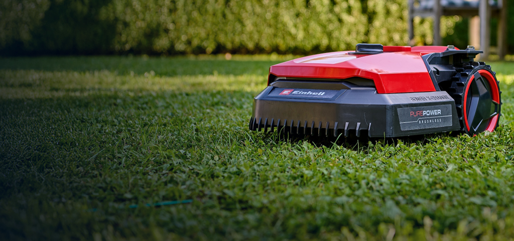 Close-up of an Einhell Freelexo robot lawn mower mowing